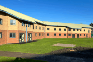 Secure Health External Lighting Oasis Secure School - Zelos Wall